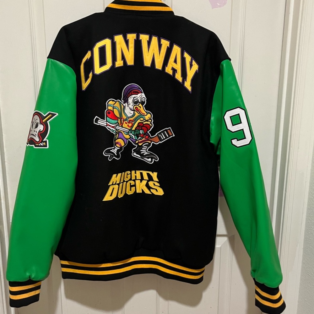 Black and Green Varsity Bomber Jacket with Color Blocking and Cartoon Design